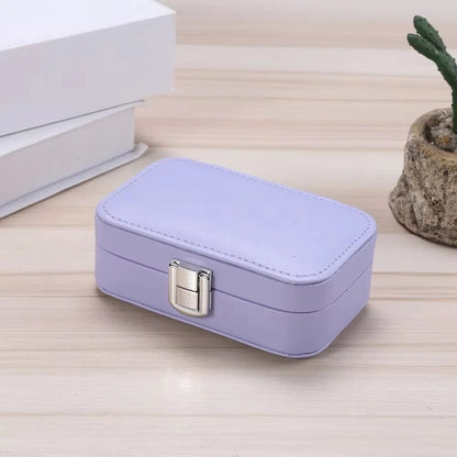 Drpshippr travel jewelry case with compartments for organizing necklaces, rings, and earrings during travel.