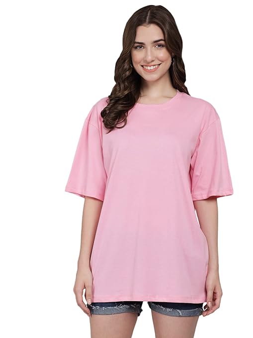 Pink oversized round neck T-shirt by FIZZI SHOP, casual fit, soft fabric, displayed on a hanger with a plain background.