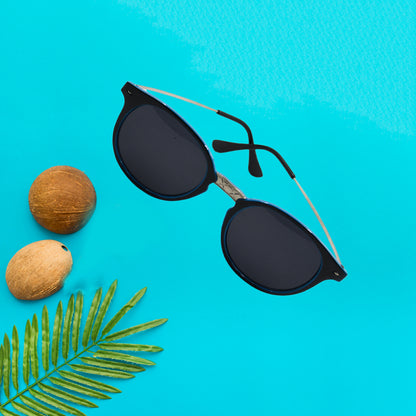 Wukusy 7756 UV protected round fashion sunglasses for men and women, lightweight and classic design, perfect for sunny days.
