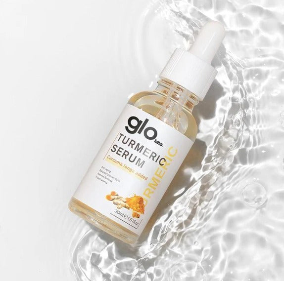 Drpshippr turmeric dark spot corrector serum in a sleek bottle, designed to fade dark spots and brighten skin.