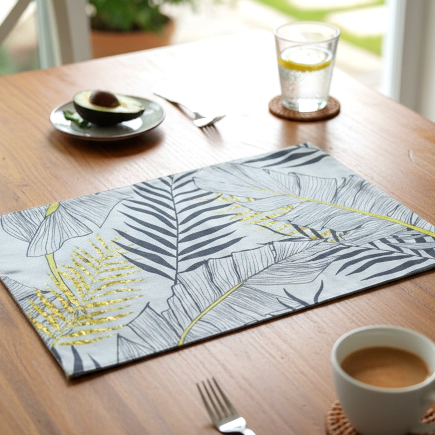 Wukusy 2-in-1 reversible dining table placemats set with small and large mats, featuring colorful, patterned designs.