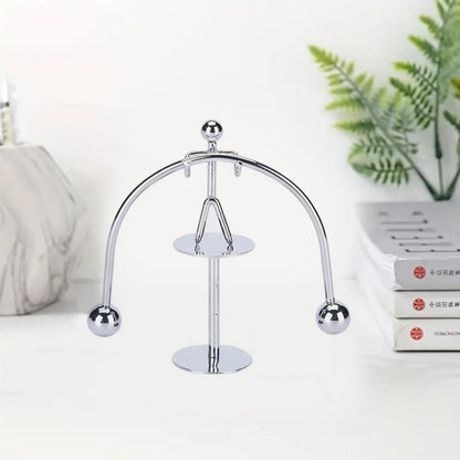 Wukusy 7850 Mini Steel Balance Toy small metal weightlifter figurine for desk decor and educational balance art display.