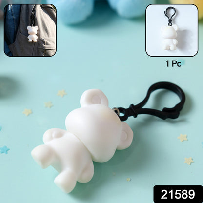 Wukusy cute bear figure keychain hanging from a set of keys, featuring a small, adorable bear design in soft colors