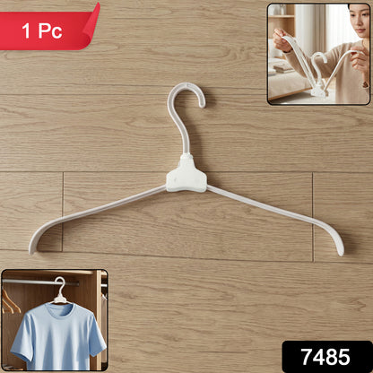 Wukusy premium foldable plastic clothes hanger hanging on a closet rod, showcasing its compact, foldable design for clothing organization.