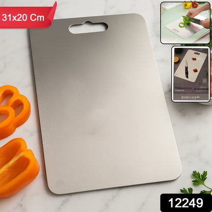 Wukusy stainless steel vegetable and fruit chopping board with a 3120 cm cutting surface, sleek and durable kitchen tool.