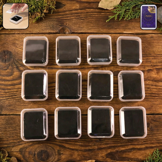Wukusy mini jewelry storage box with 12 compartments for rings, earrings, and small accessories, made of clear plastic.