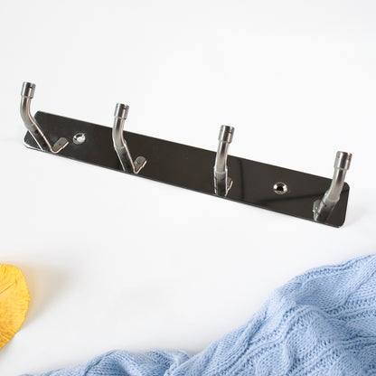 Wukusy stainless steel wall-mounted coat rack with four hooks, ideal for home entryways and kitchen organization.
