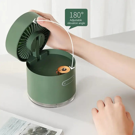 Ekom mini desktop cooling fan with rotating spray humidifier, small water tank, compact design, ideal for computers and tablets.