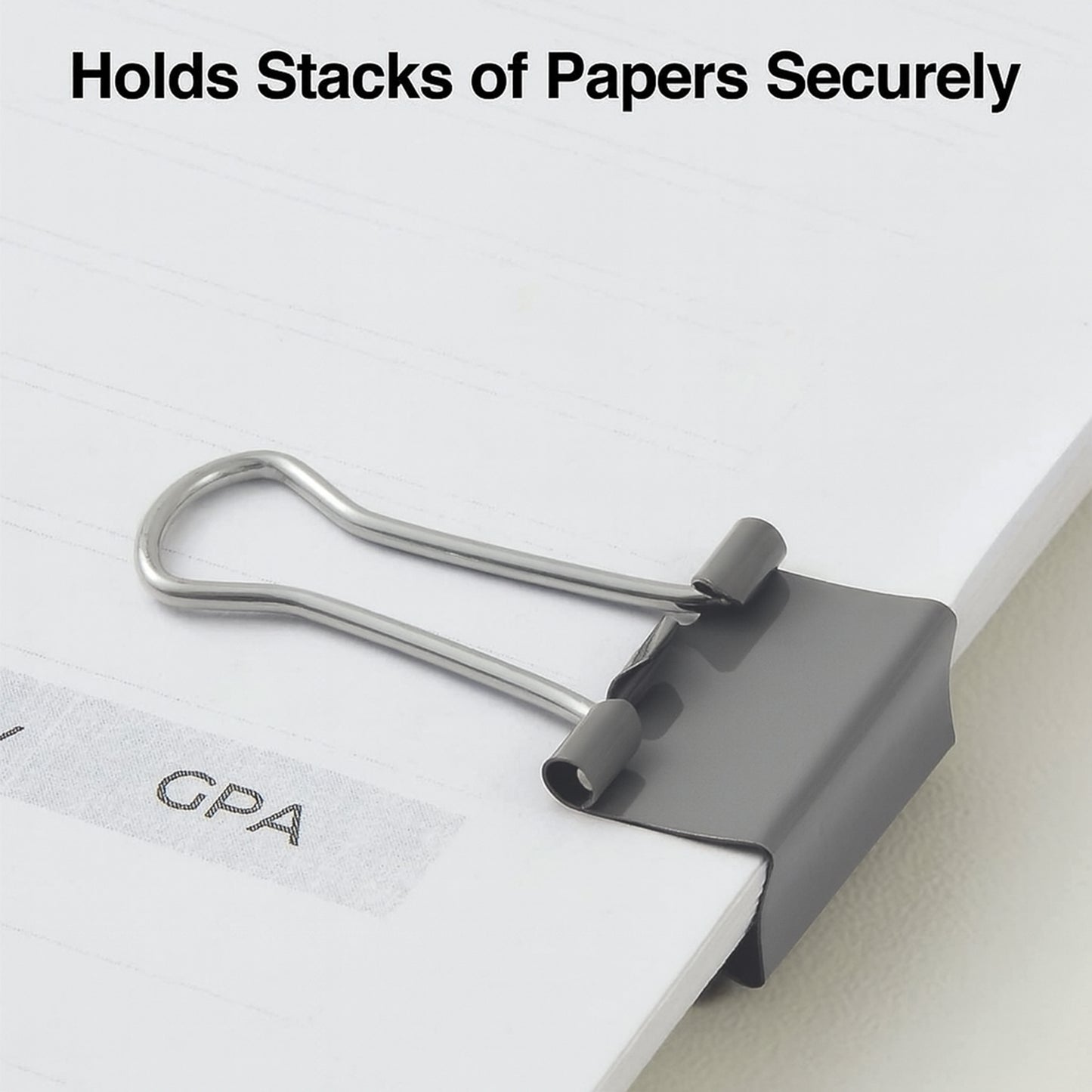 Heavy-duty Wukusy foldback binder clip holding papers, ideal for home improvement and organization tasks.
