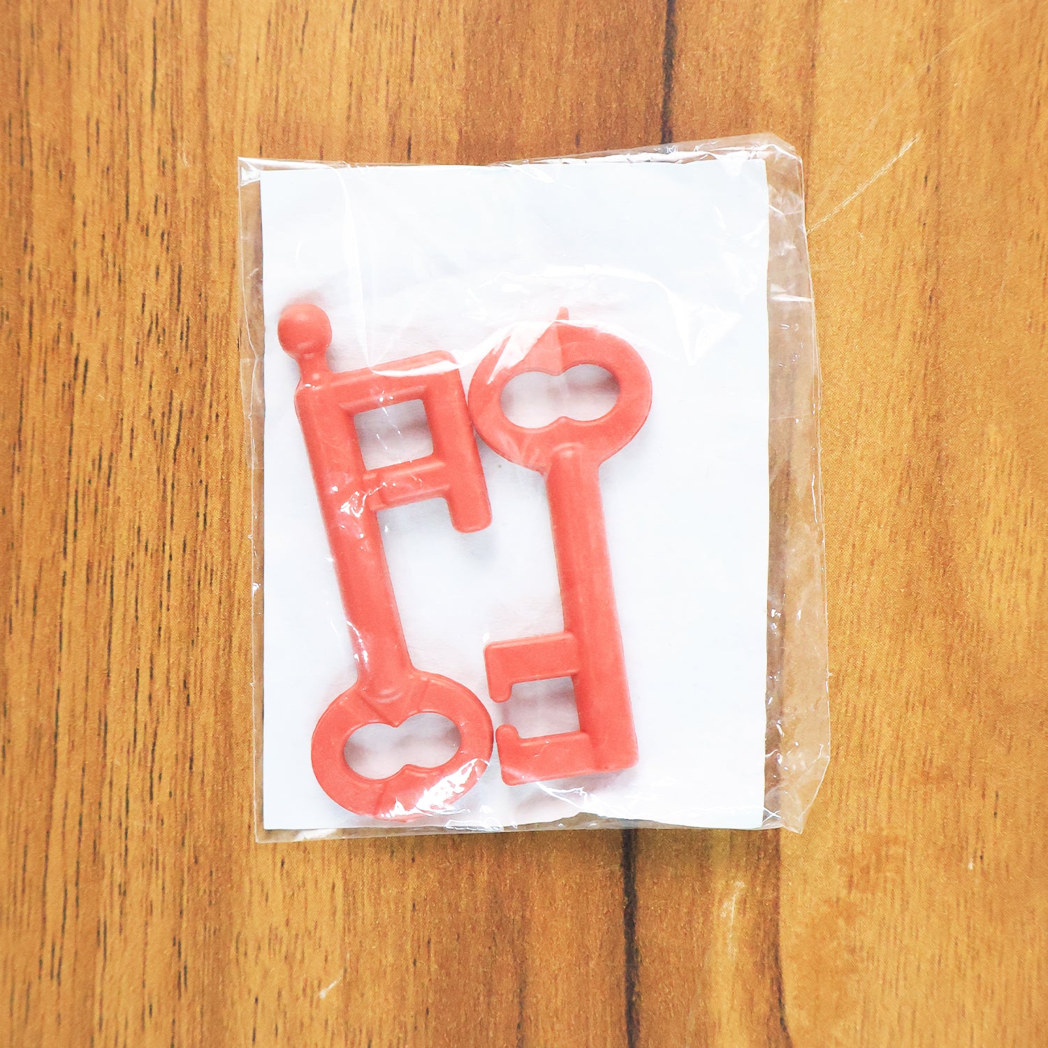Wukusy Magic Key Puzzle Set with colorful keys and intricate design, a fun brain teaser toy for kids and adults.