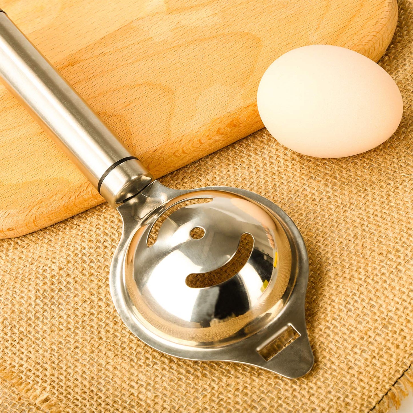 Wukusy premium stainless steel egg separator tool for home and kitchen use, showing the sleek, cylindrical design with separator slots.