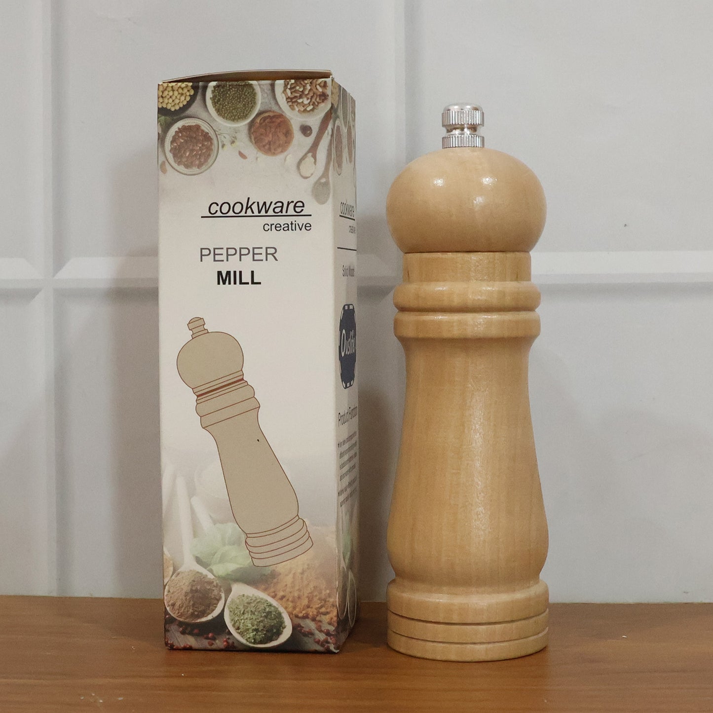 Wukusy classic wooden manual pepper grinding mill with a natural wood finish and adjustable ceramic grinding mechanism.