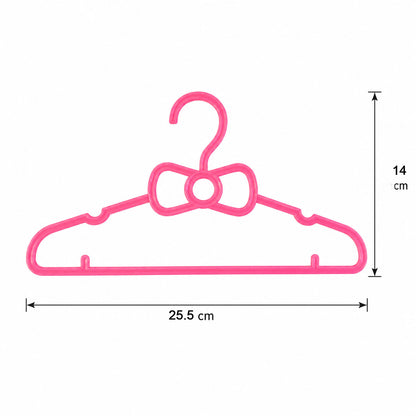 Set of four Wukusy kids plastic clothes hangers with cute bow design, perfect for baby wardrobe organization.