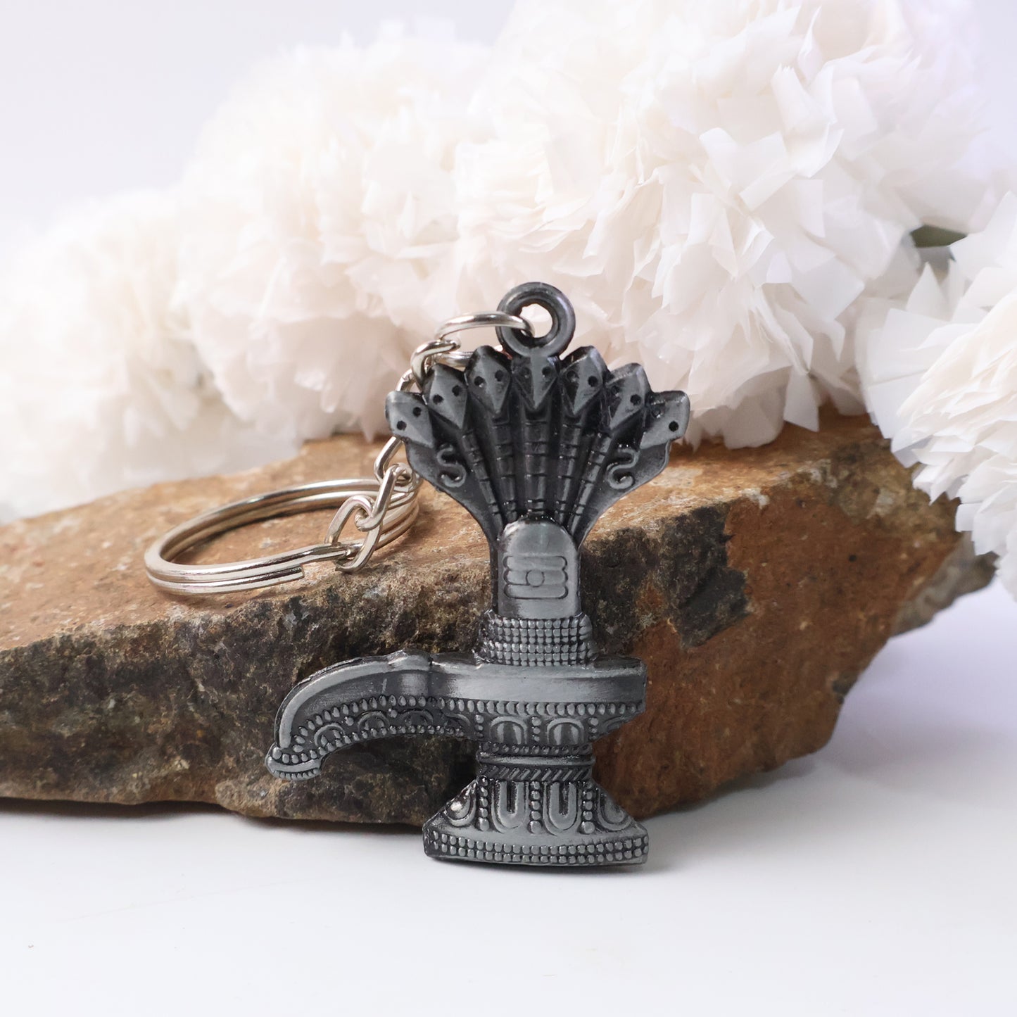 Premium metal Shiva Lingam with Naag religious keychain by Wukusy, detailed design visible in the image.