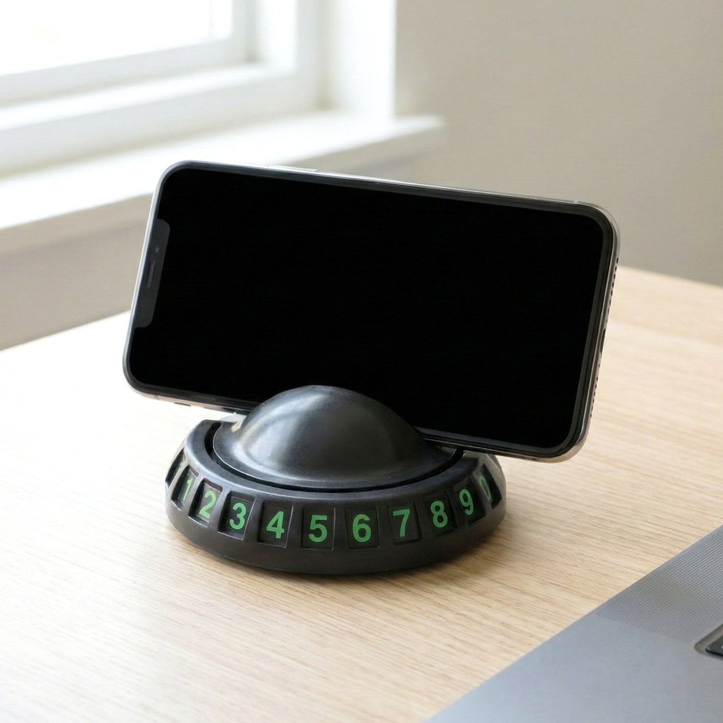 Wukusy 360° rotating anti-slip car dashboard mobile phone holder securely holds a smartphone in a car dashboard mount.