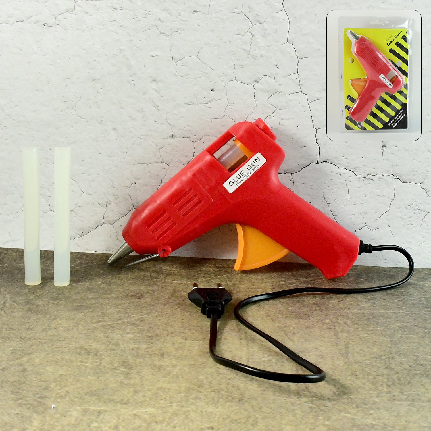 Wukusy professional 60W hot melt glue gun with on/off switch and glue stick for office use, shown on a clean workspace.