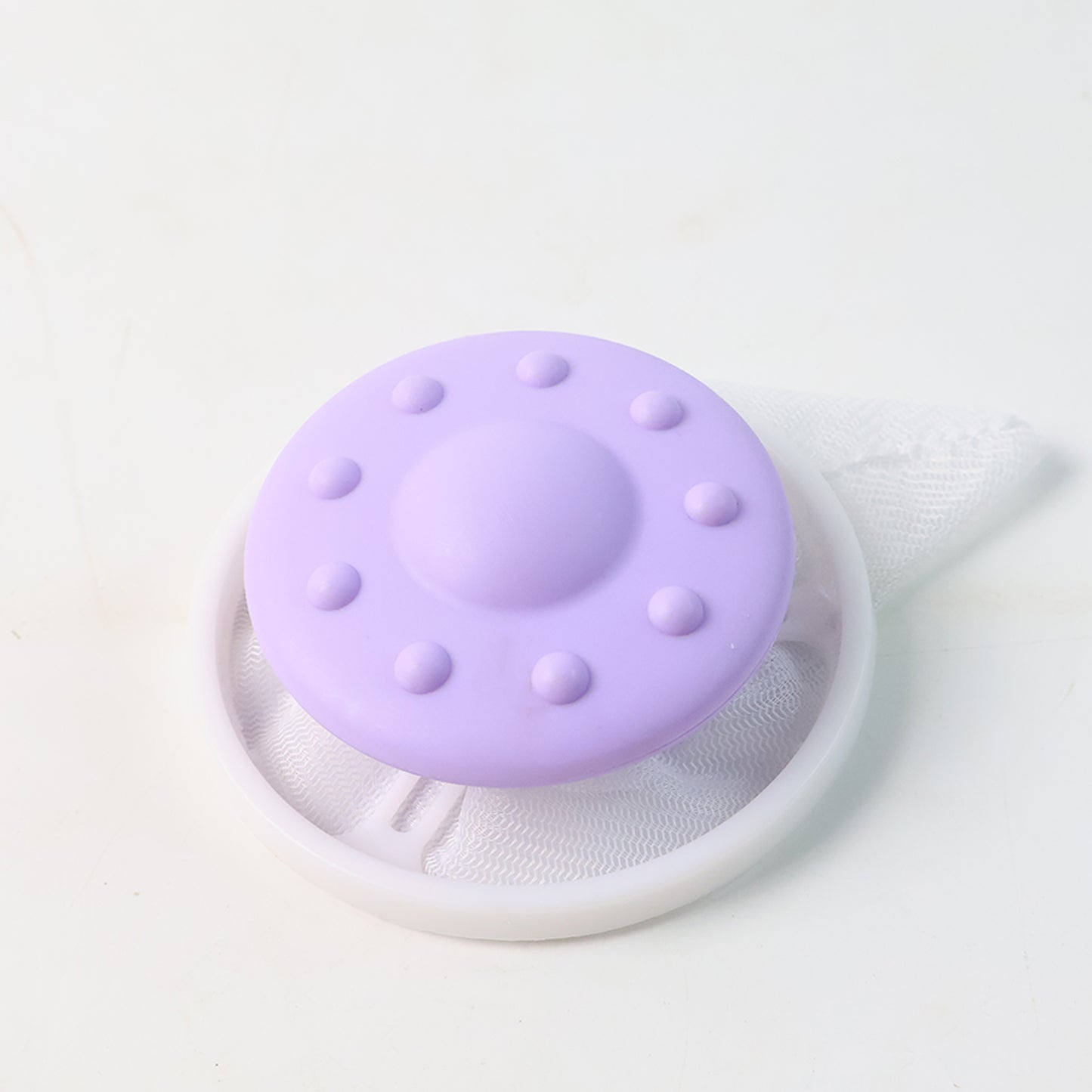 Wukusy floating washing machine lint mesh filter bag for home laundry, showing the mesh bag with drawstring closure.