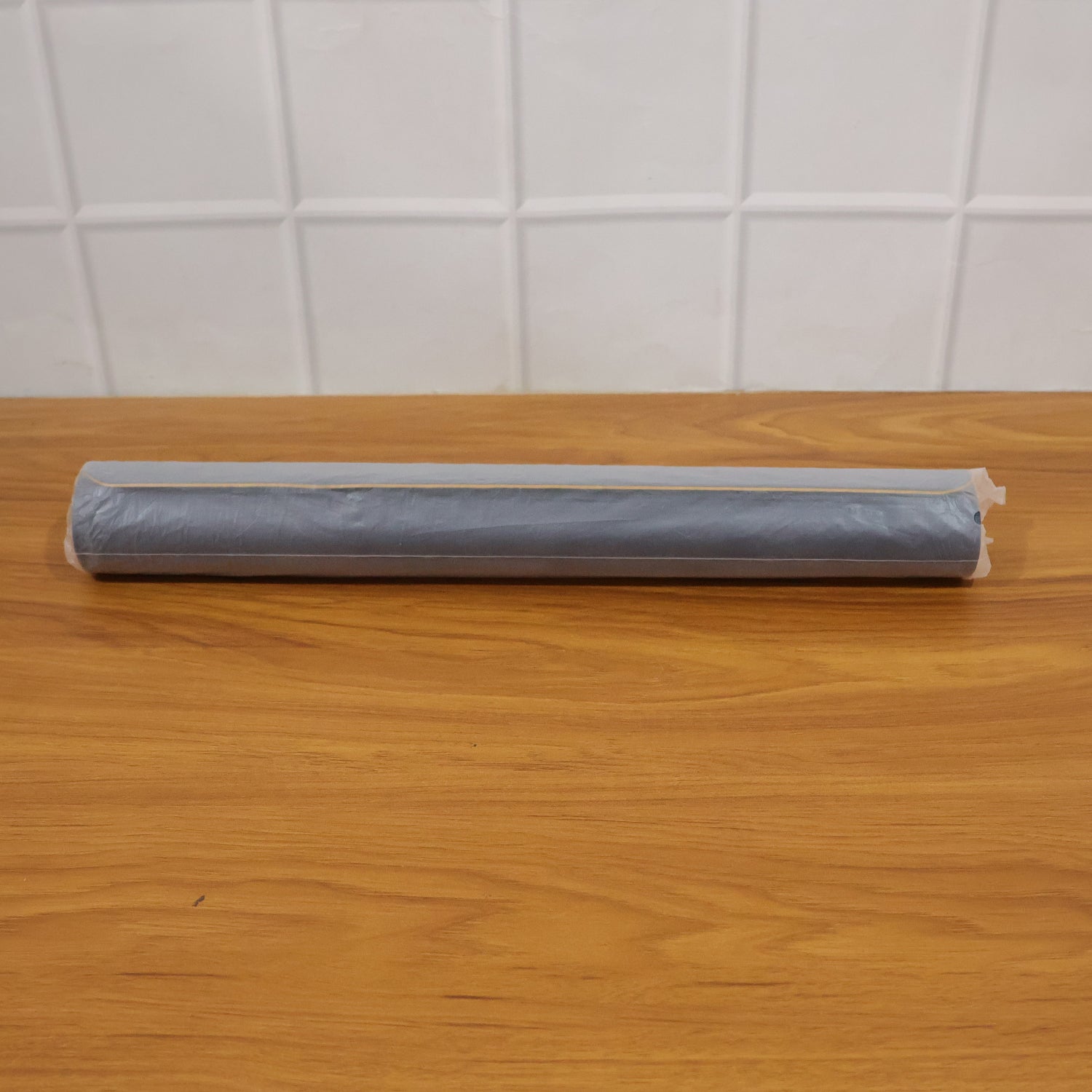 Large Wukusy premium anti-slip desk mat and mouse pad, 80x40 cm, with a smooth surface suitable for office or gaming setups.