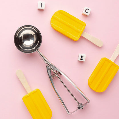 Wukusy premium stainless steel ice cream scoop with trigger release and 70ml capacity, shown with scooped ice cream.