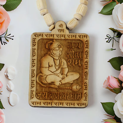 Wooden Hanuman pendant mala from Wukusy featuring a detailed carved Hanuman figure on natural wood beads.
