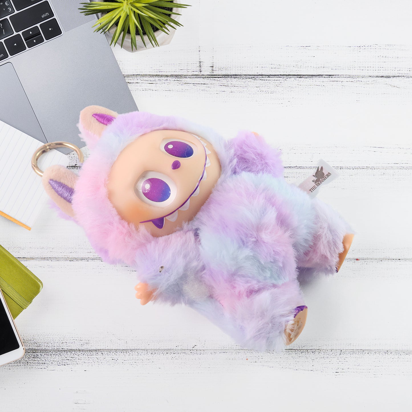 Light purple plush cartoon keychain toy with hook from Wukusy, featuring colorful light purple plush and playful design.