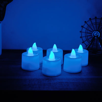 Set of six blue LED tea light candles by Wukusy, emitting a soft glow, ideal for ambiance and decorative lighting.
