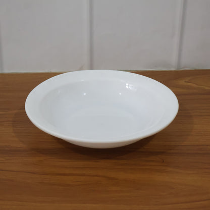 Deep round curry bowl by Wukusy, featuring a smooth ceramic surface and classic design, perfect for serving delicious dishes.