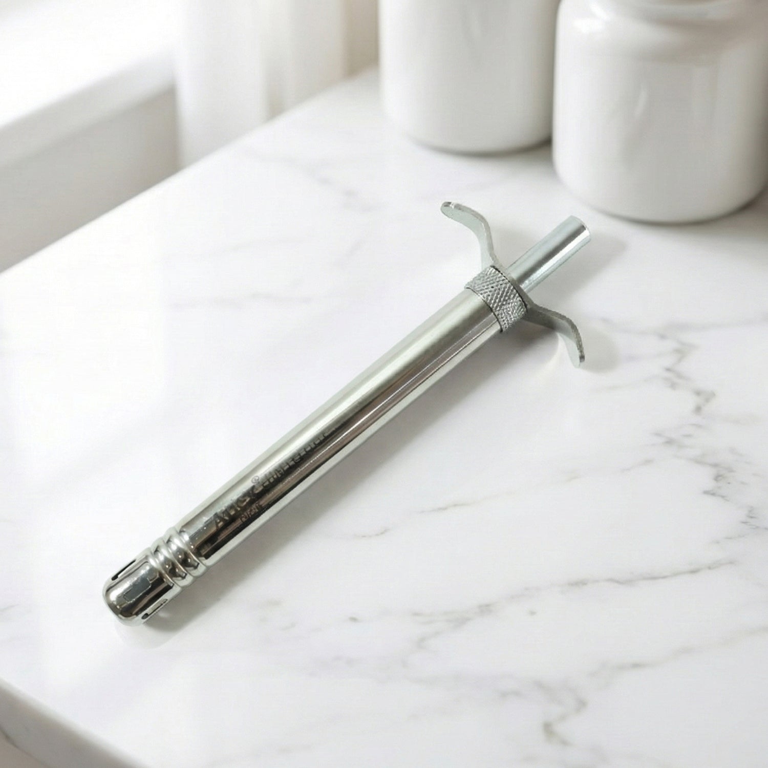 Wukusy manual stainless steel gas stove spark lighter with ergonomic handle and ignition button for easy lighting.