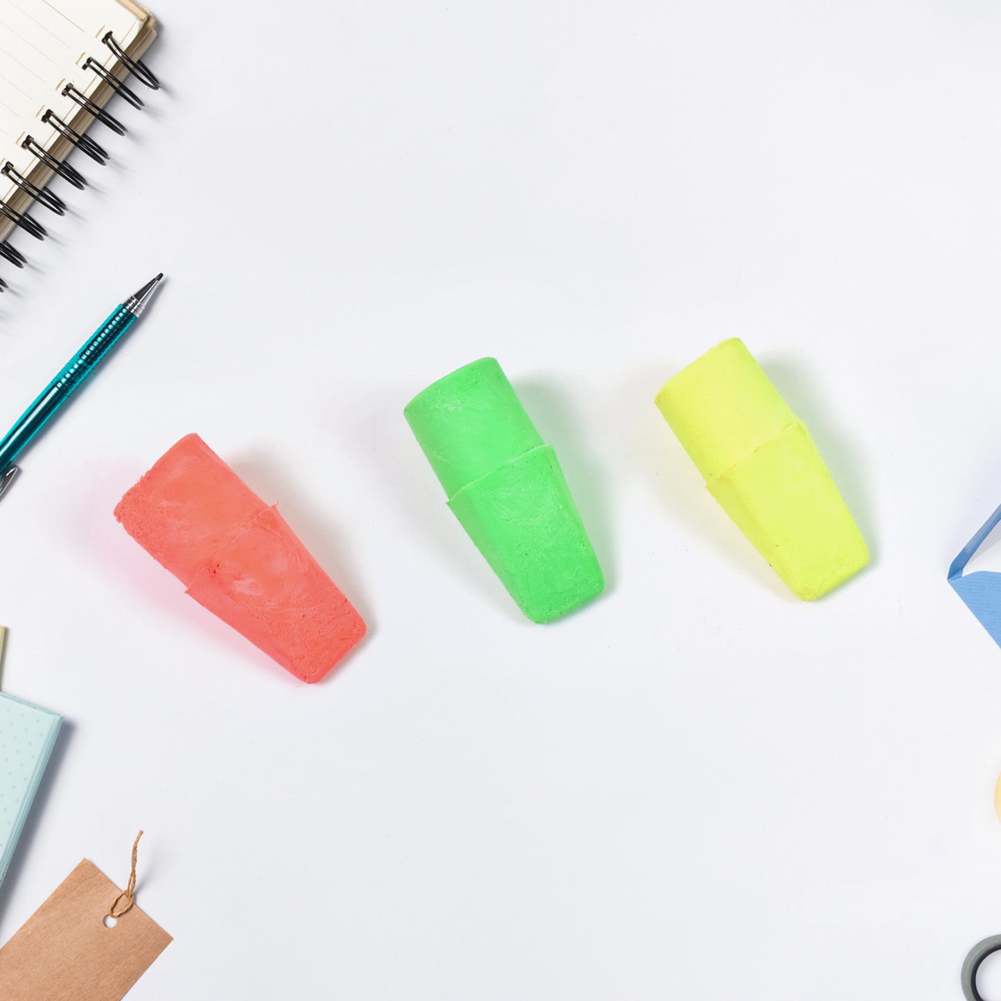 Wukusy office pencil top eraser with mixed colors and fun design, perfect for erasing pencil marks on paper.