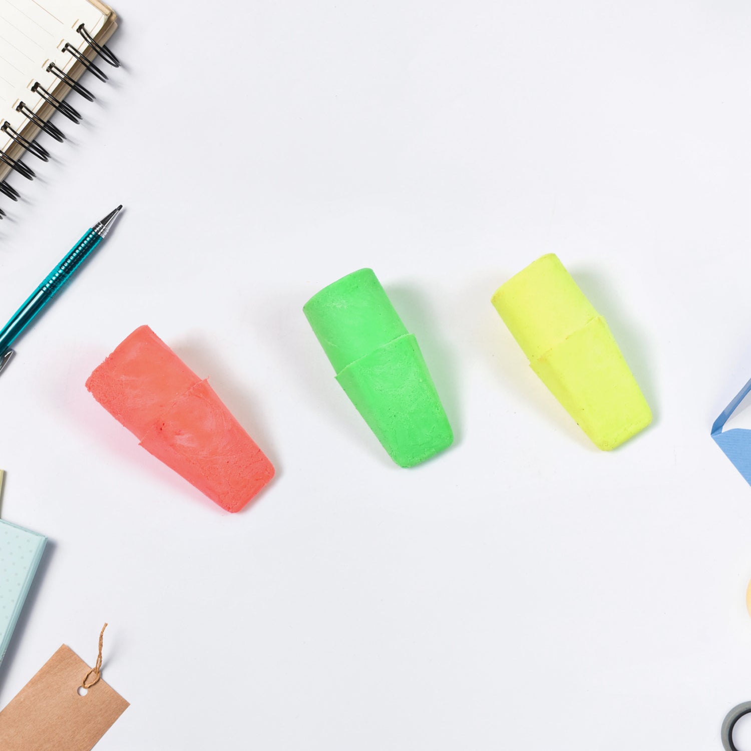 Wukusy office pencil top eraser with mixed colors and fun design, perfect for erasing pencil marks on paper.