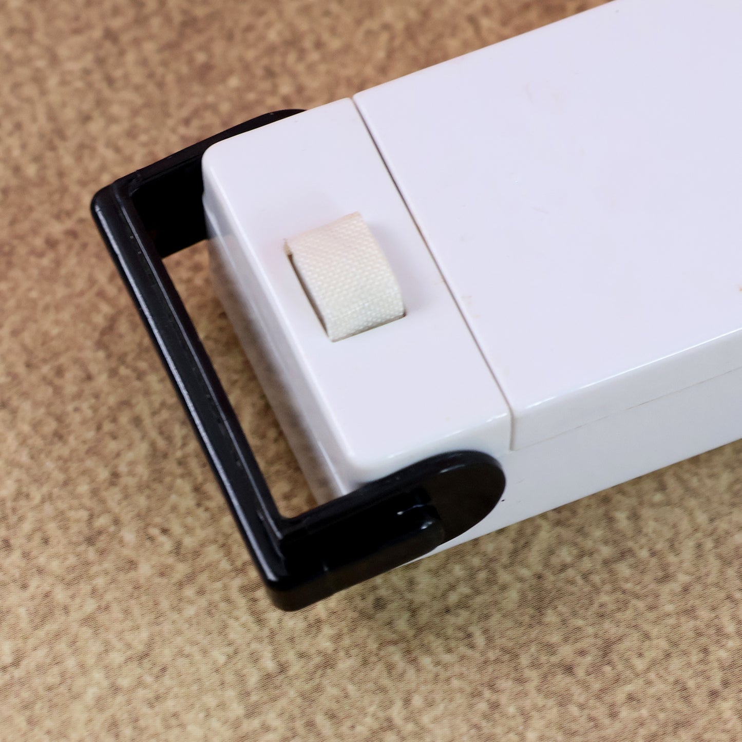 Wukusy portable mini heat sealer machine for plastic bags, compact home and kitchen tool for sealing food storage bags.