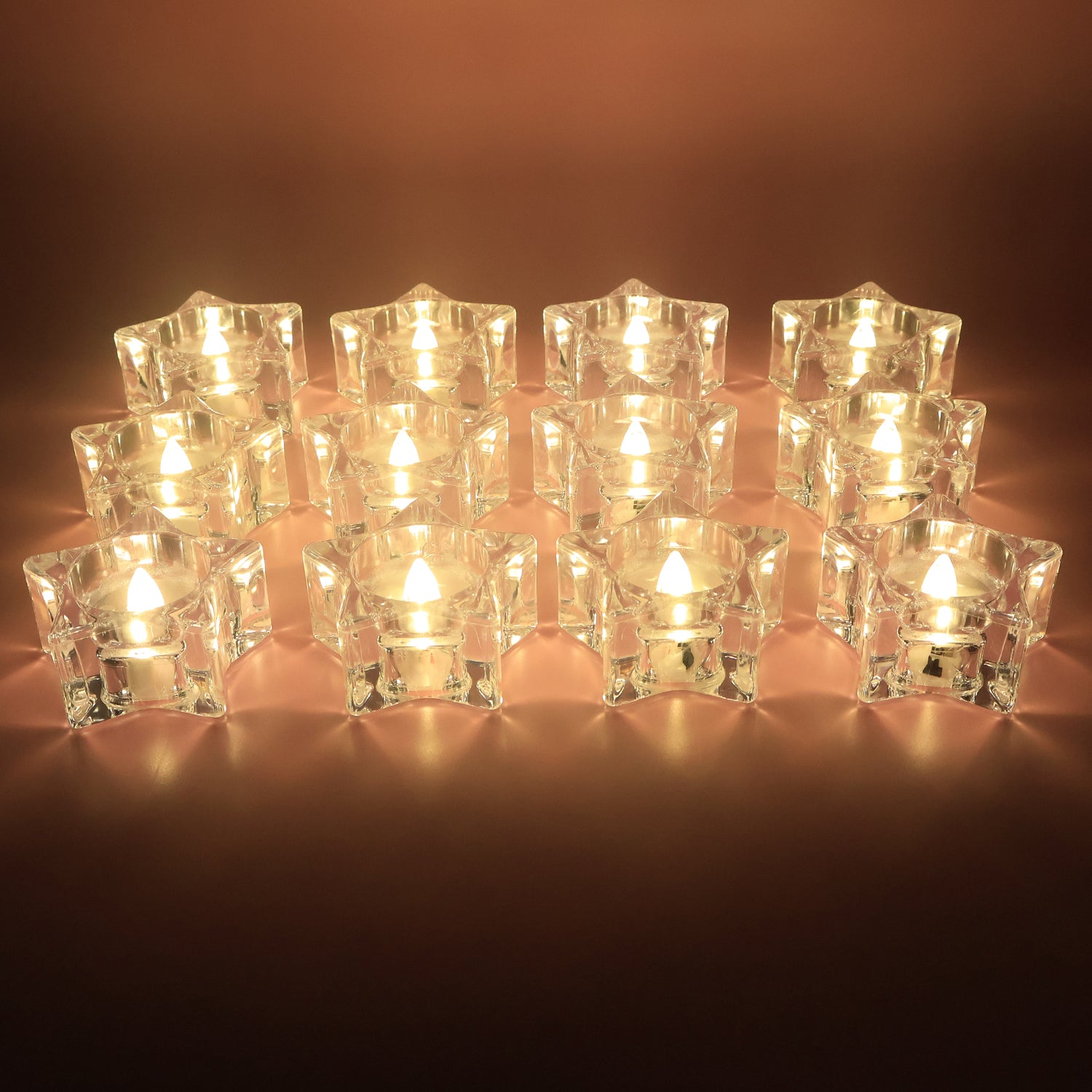 Set of 12 Wukusy LED crystal-effect flameless smokeless candles for elegant home decor, featuring warm flickering light.