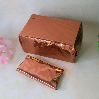 Wukusy premium metallic gift wrapping paper sheets in mixed colors, 45 sheets, 70x50 cm, featuring shiny, decorative wrapping paper.