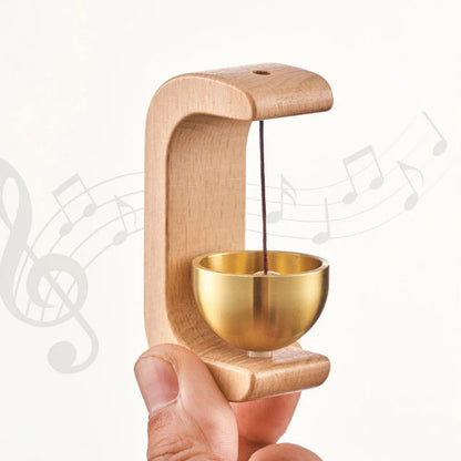 Wukusy premium desktop Japanese-style Zen bell with intricate detailing and a wooden striker, designed for calming ambiance.