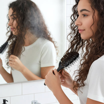 Wukusy plastic soft wide tooth detangling hair comb, lightweight and gentle for all hair types, shown in close-up.