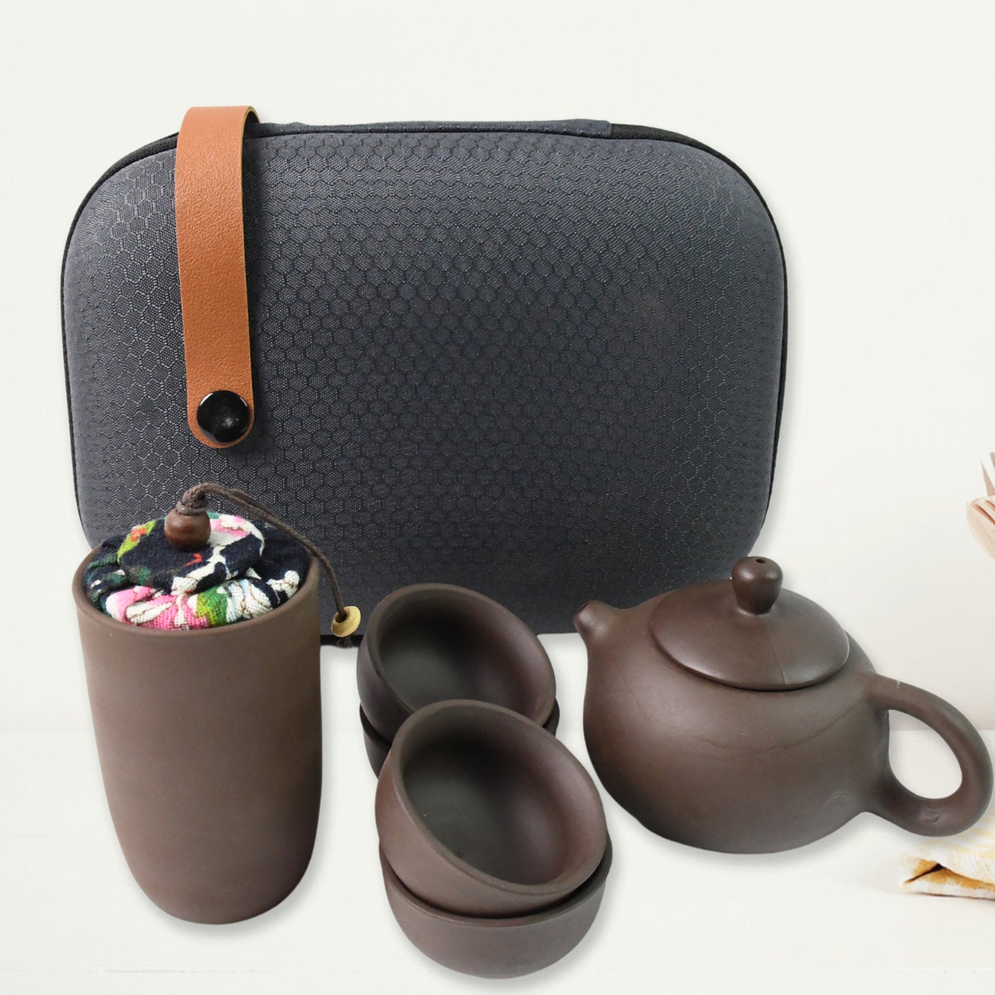 Wukusy portable Kung Fu tea set with six pieces displayed in a travel bag, ideal for home decor and on-the-go tea brewing.