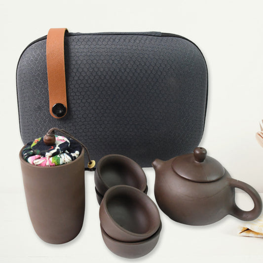 Wukusy portable Kung Fu tea set with six pieces displayed in a travel bag, ideal for home decor and on-the-go tea brewing.