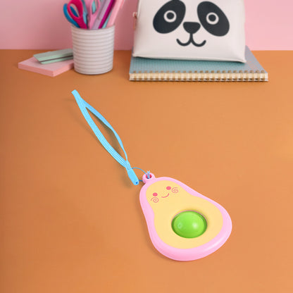 Cute avocado-shaped mini push pop keychain toy with strap from Wukusy, designed for fun and easy carrying.