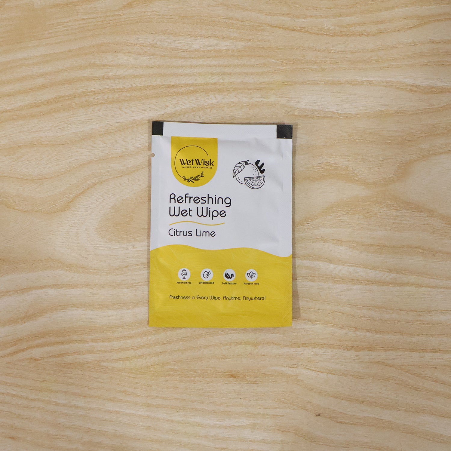 Wukusy Citrus Lime refreshing wet wipe for face, hands, and body with fresh cleansing properties, showing the wipe and citrus fruits.