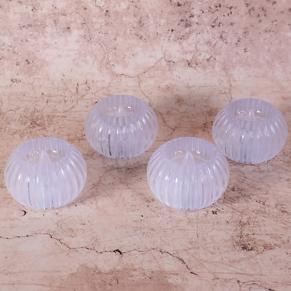 Set of four Wukusy LED flameless decorative candles for home decor, with realistic flickering flame effects.
