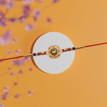 Traditional Kundan Rakhi featuring antique gold finish and multicolor beads, showcasing intricate craftsmanship and vibrant design.