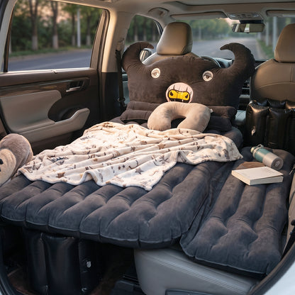 Wukusy car air mattress set with black monster pillow and cushions, suitable for kids and adults, shown inflated in a car interior.