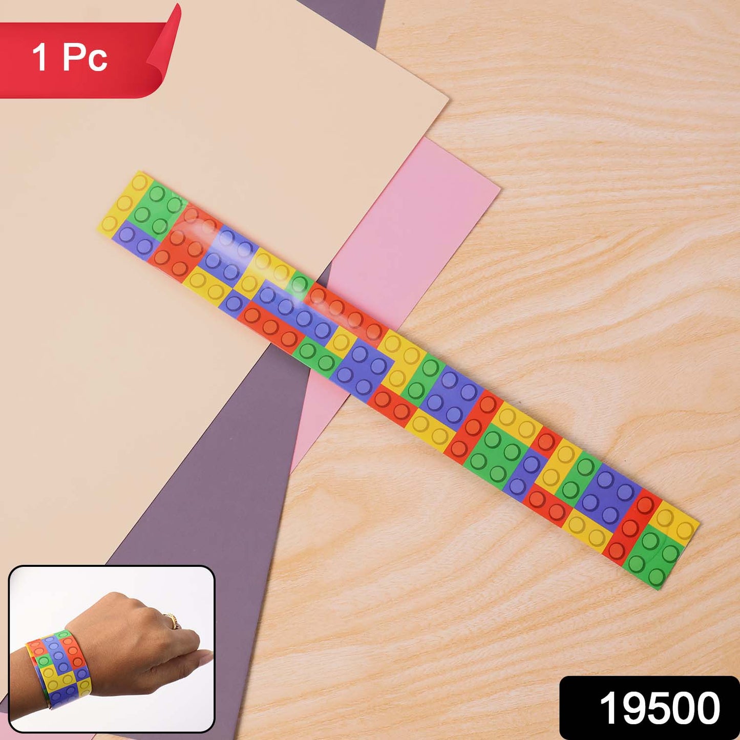 Colorful Snap Slap Bracelet toy by Wukusy, featuring vibrant, flexible plastic with a quick snap design for fun wristwear.