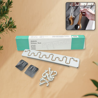 Wukusy 9431 Slideway adjustable plastic adhesive wall hook, ideal for bathroom and home organization.