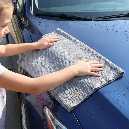 Wukusy disposable microfiber cleaning cloth roll, reusable kitchen towel tear-off, shown in a roll with tear-off sheets for cleaning.