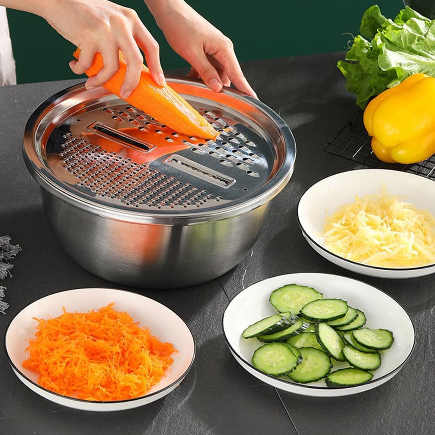 Wukusy 3-in-1 stainless steel mixing, straining, and grater bowl set with multiple attachments and ergonomic handles.