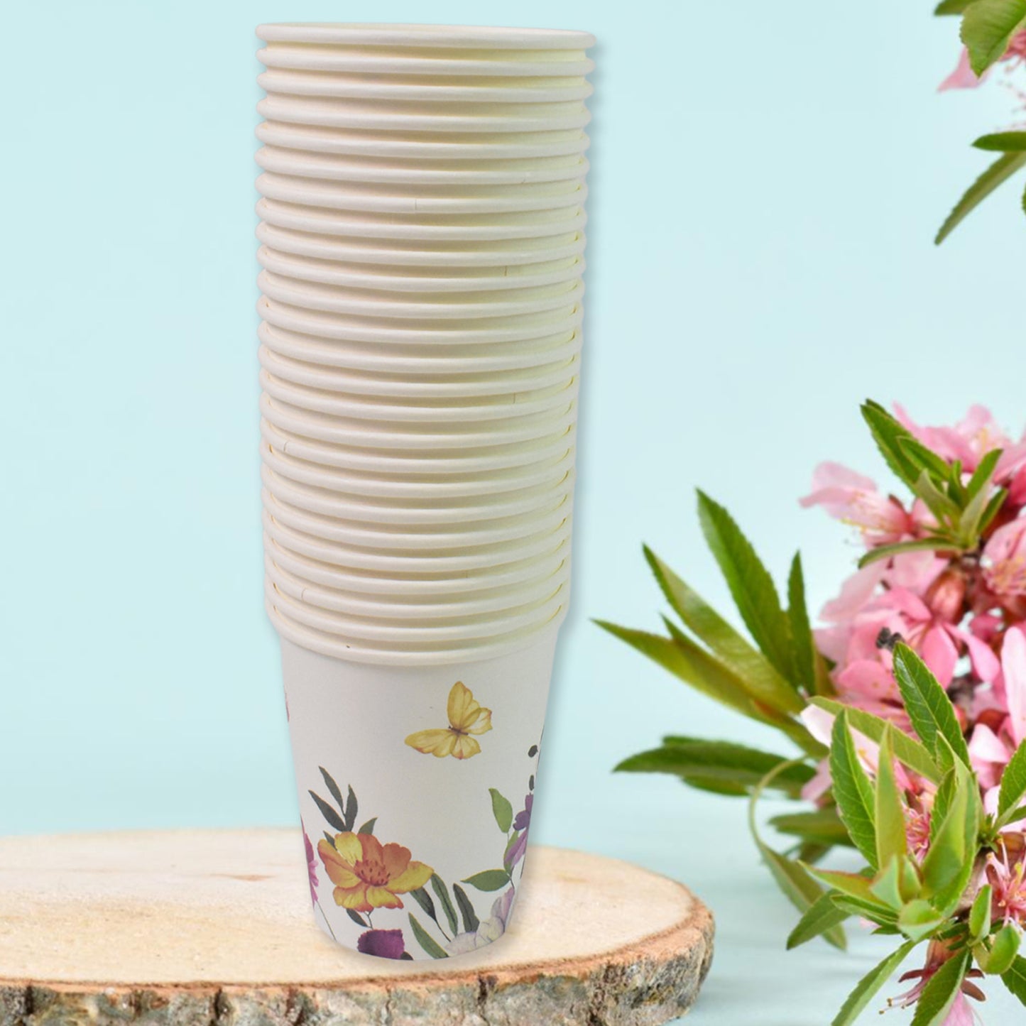 Set of 24 Wukusy disposable paper cups with colorful mixed designs, ideal for tea and coffee at home or events.