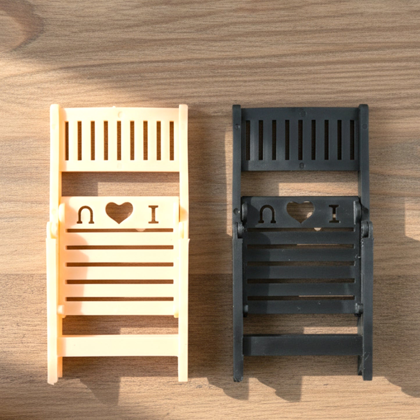 Wukusy mini chair-shaped mobile stand holder, compact and colorful, designed to hold smartphones securely on a desk or table