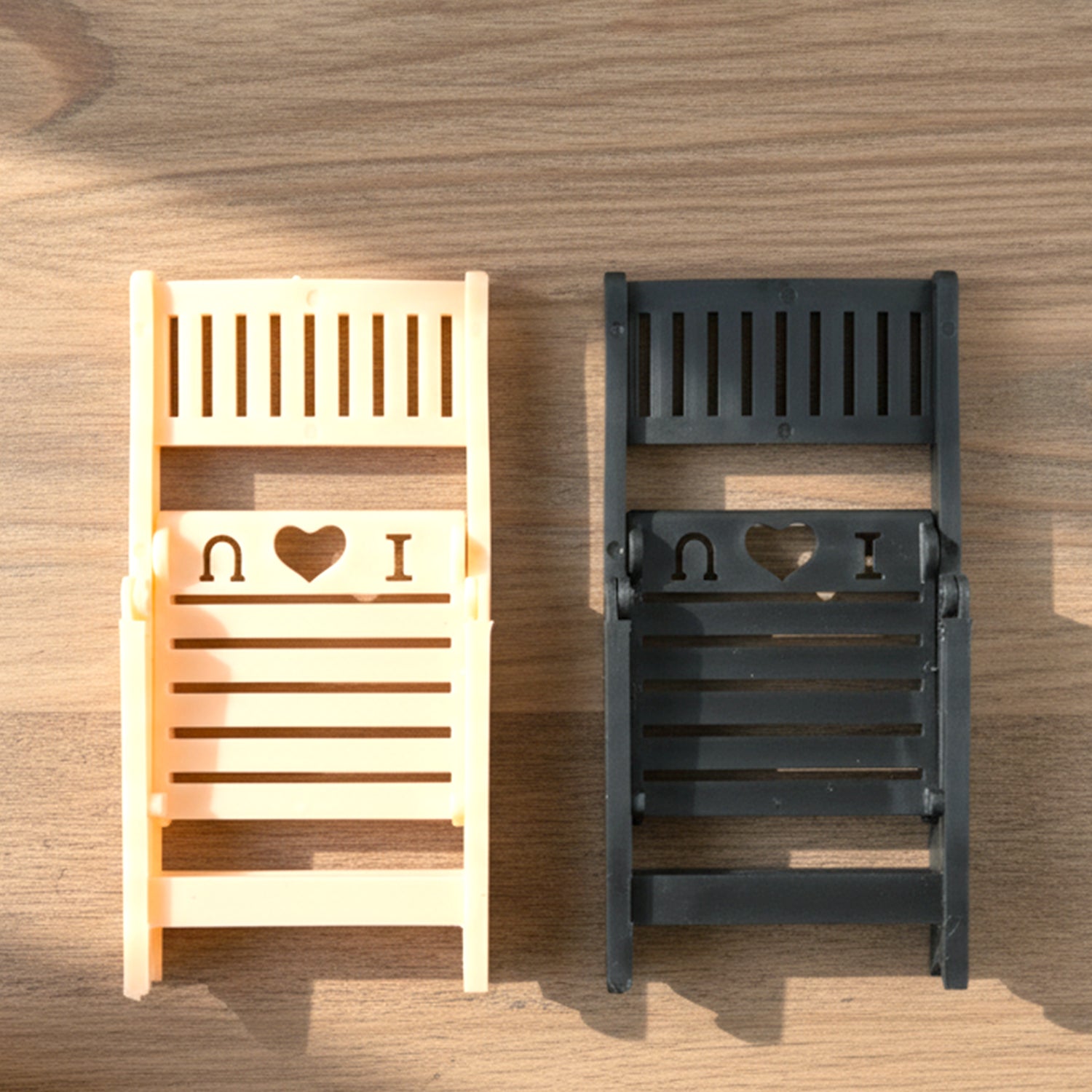 Wukusy mini chair-shaped mobile stand holder, compact and colorful, designed to hold smartphones securely on a desk or table