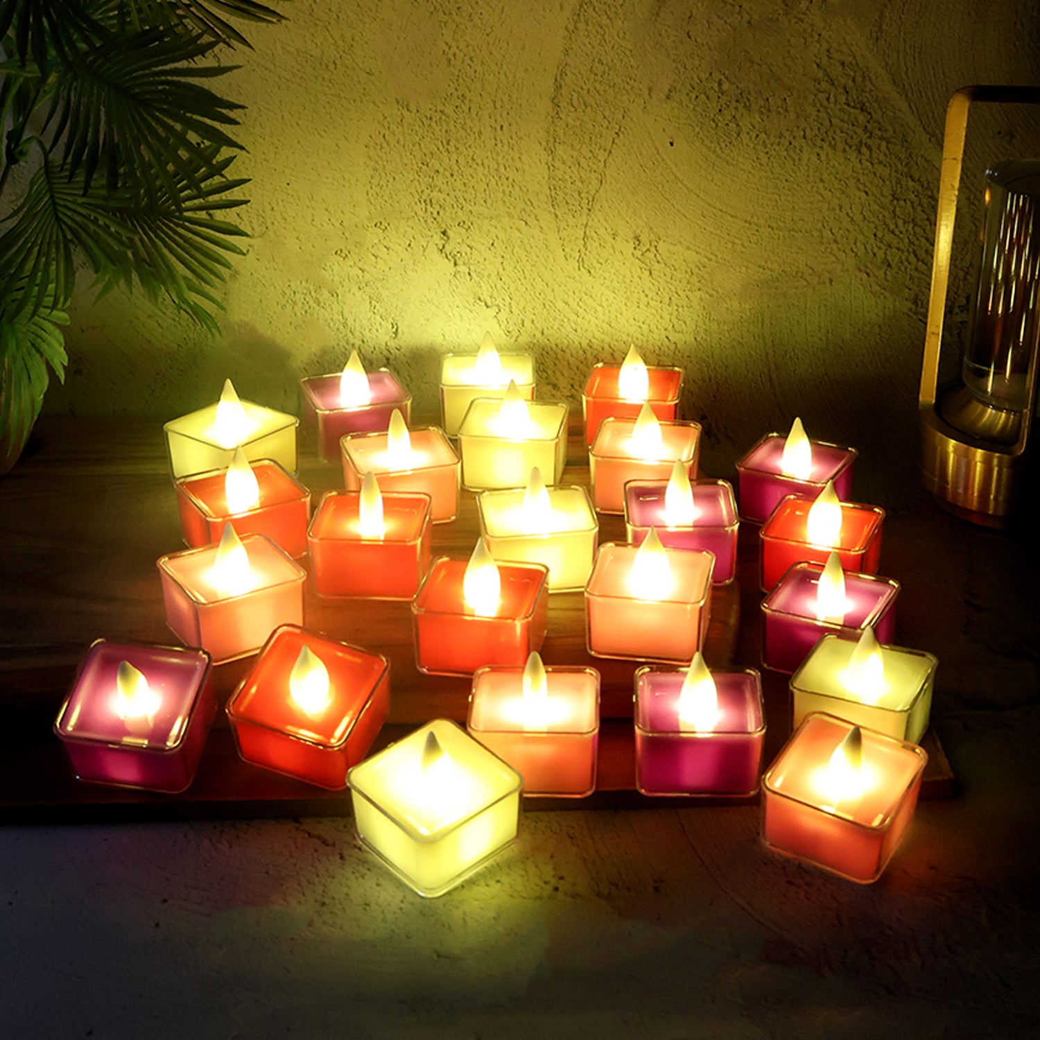 Set of 24 multi-color LED tealight candles for home decor, featuring warm glow and safe, flameless lighting by Wukusy.